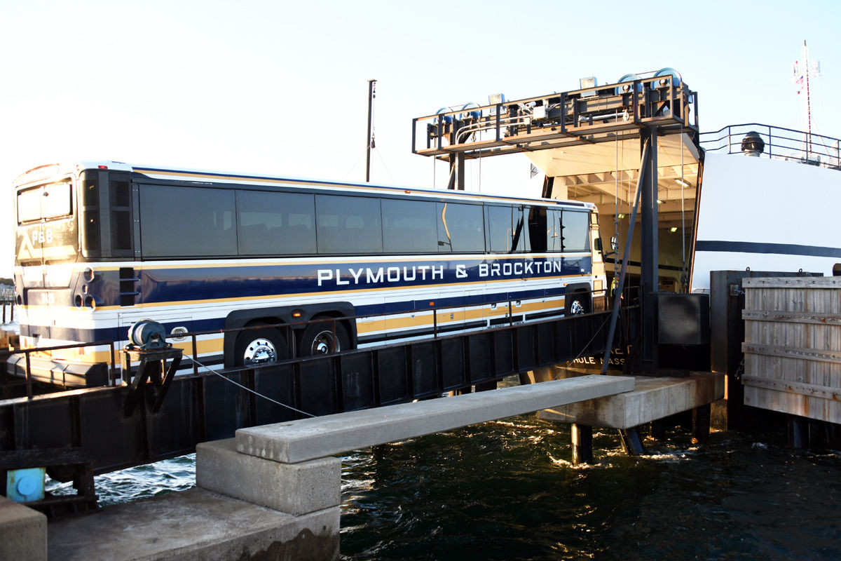 240 Vijay driving the motorcoach onto the ferry at Martha's Vineyard to return to Cape Cod..jpg